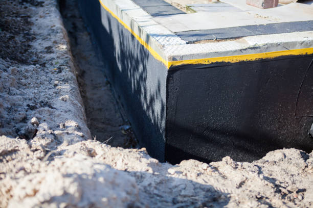 Professional Waterproofing technician working in Bensenville, IL